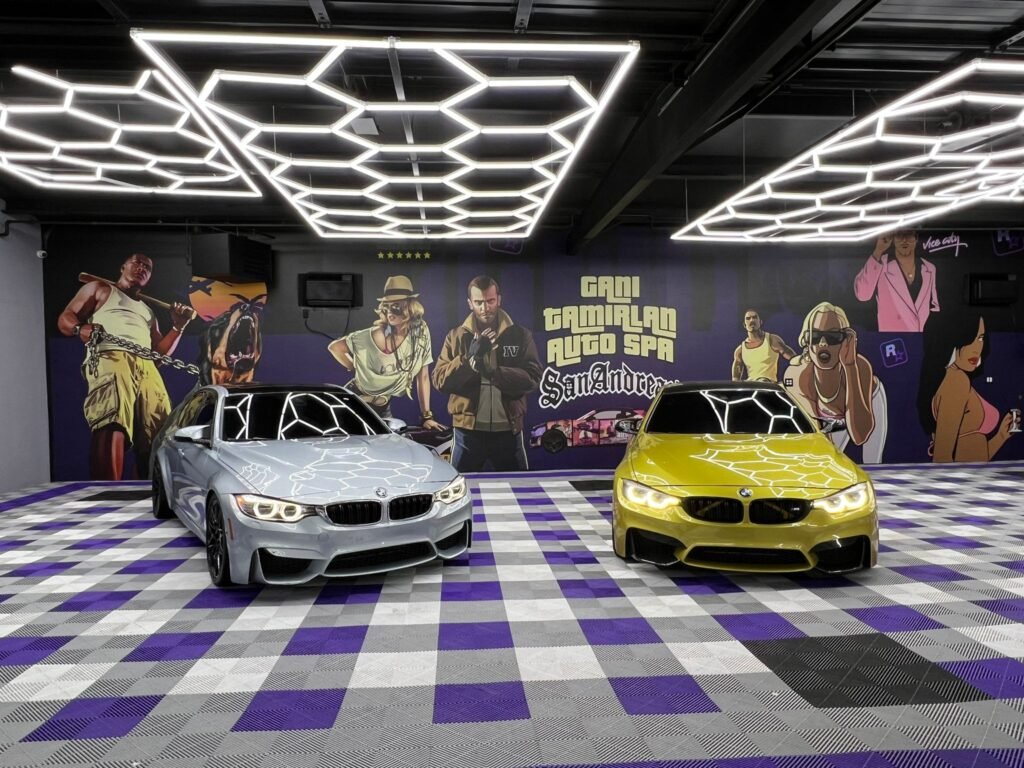 Two custom cars in the GTA Custom garage showcasing our expertise